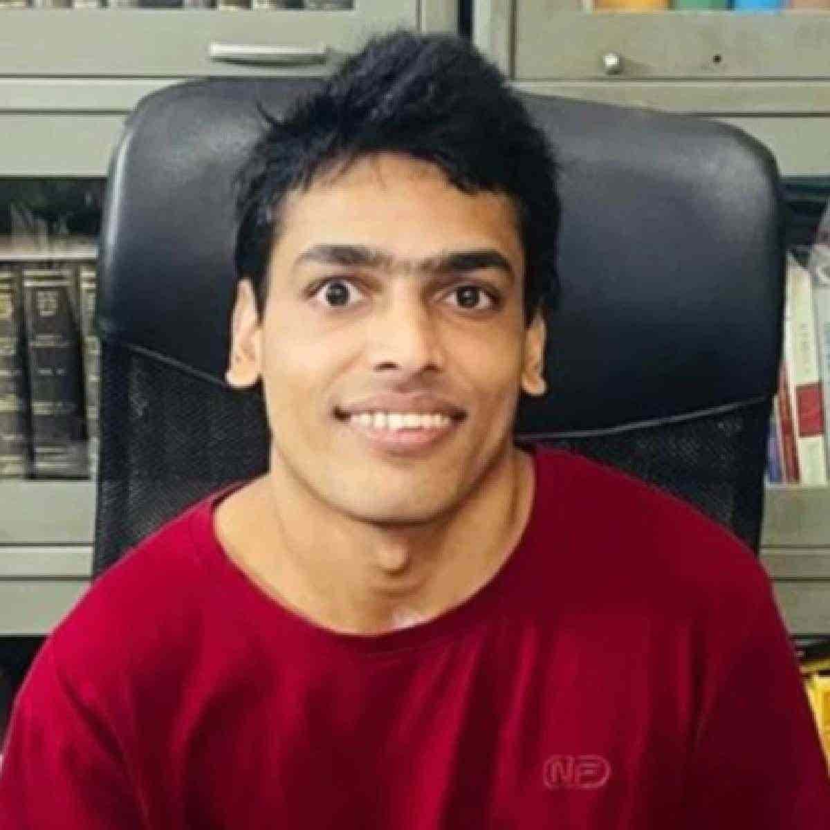 Dr Praveen M